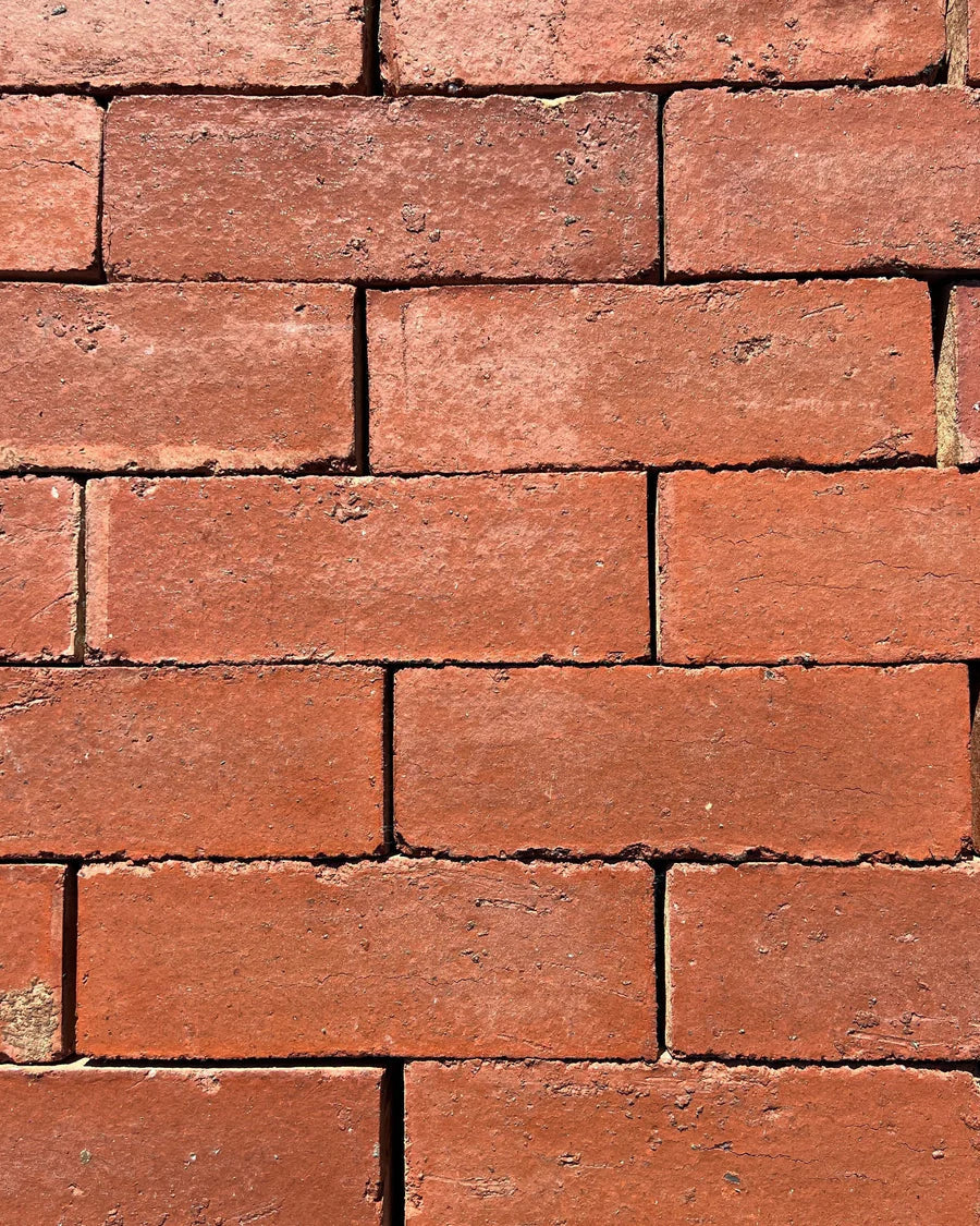 Pressed Bricks are a type of brick that are made by pressing clay into moulds and then firing them at high temperatures.