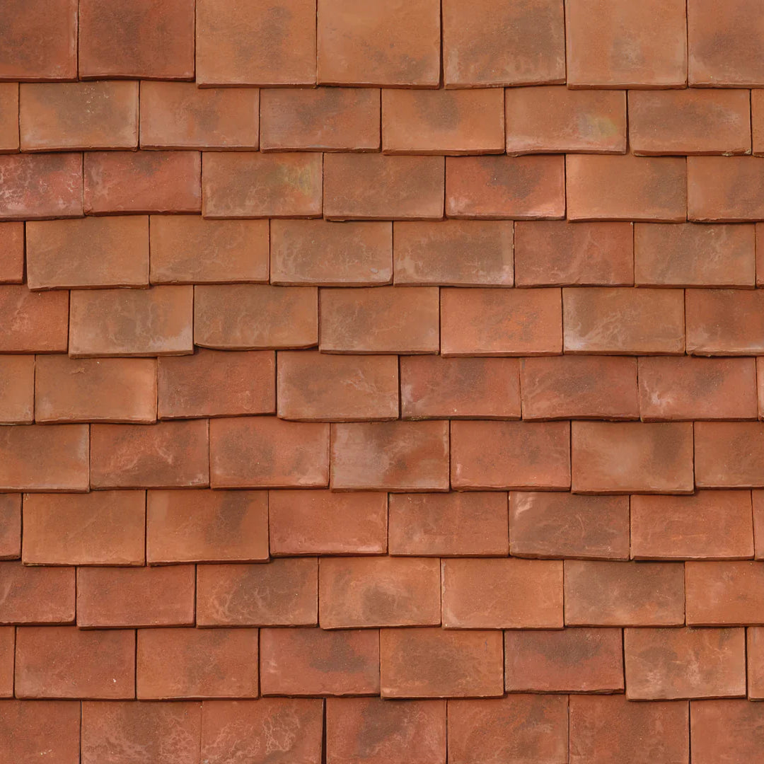 The finest clay roof tiles, handmade using traditional English methods. These beautiful clay tiles offer individuality in appearance and blend