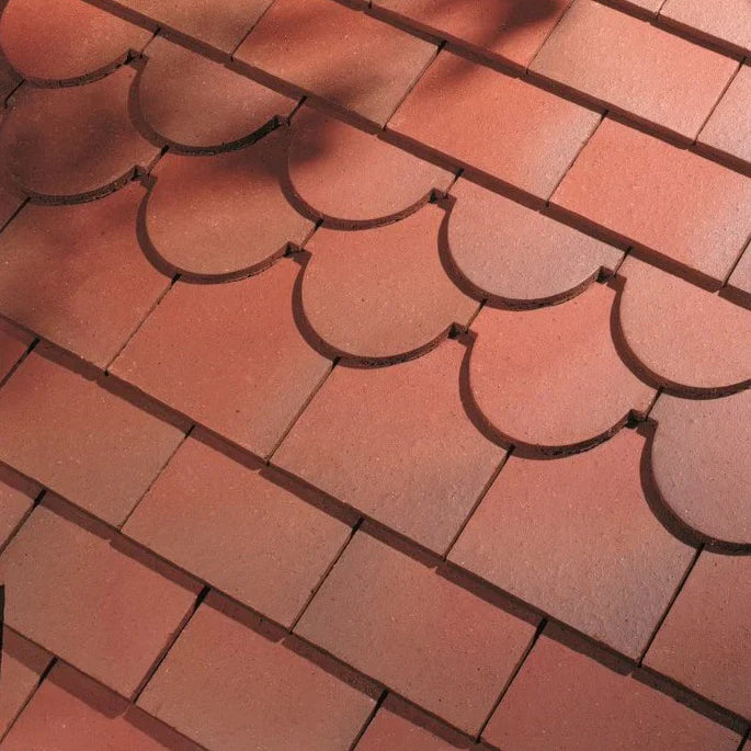 Traditional machine made plain clay tiles in beautiful natural permanent clay colours that will not fade over time in both sand faced and smooth faced finishes. Each tile is crafted, produced and tested to last a lifetime.