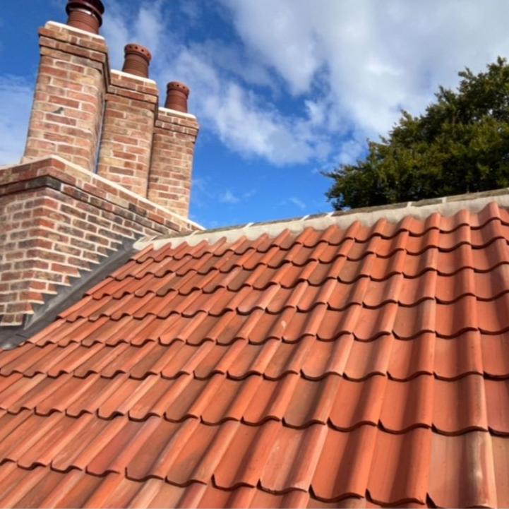 Old english country home with new natural clay pantile roof