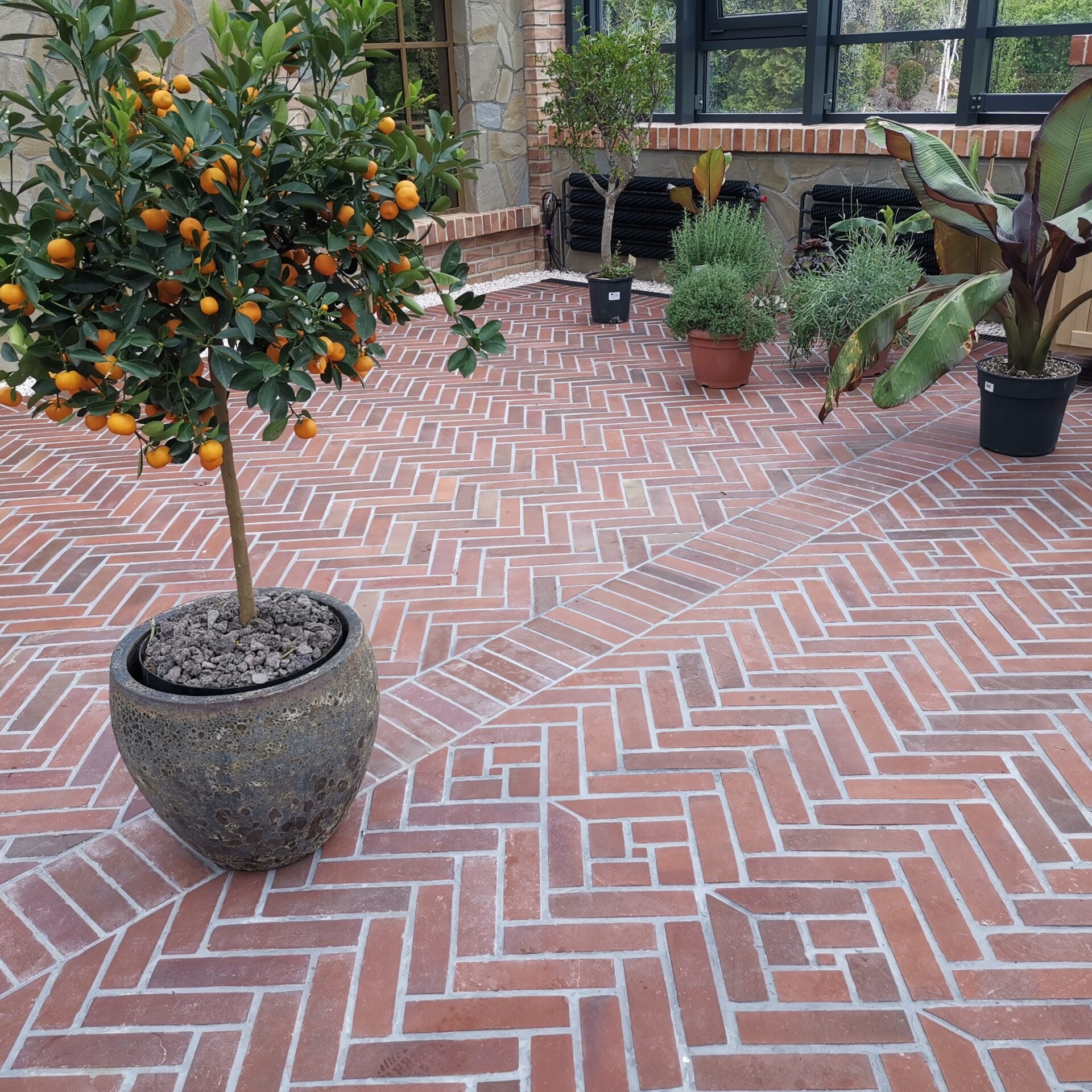 clay brick paver herringbone courtyard