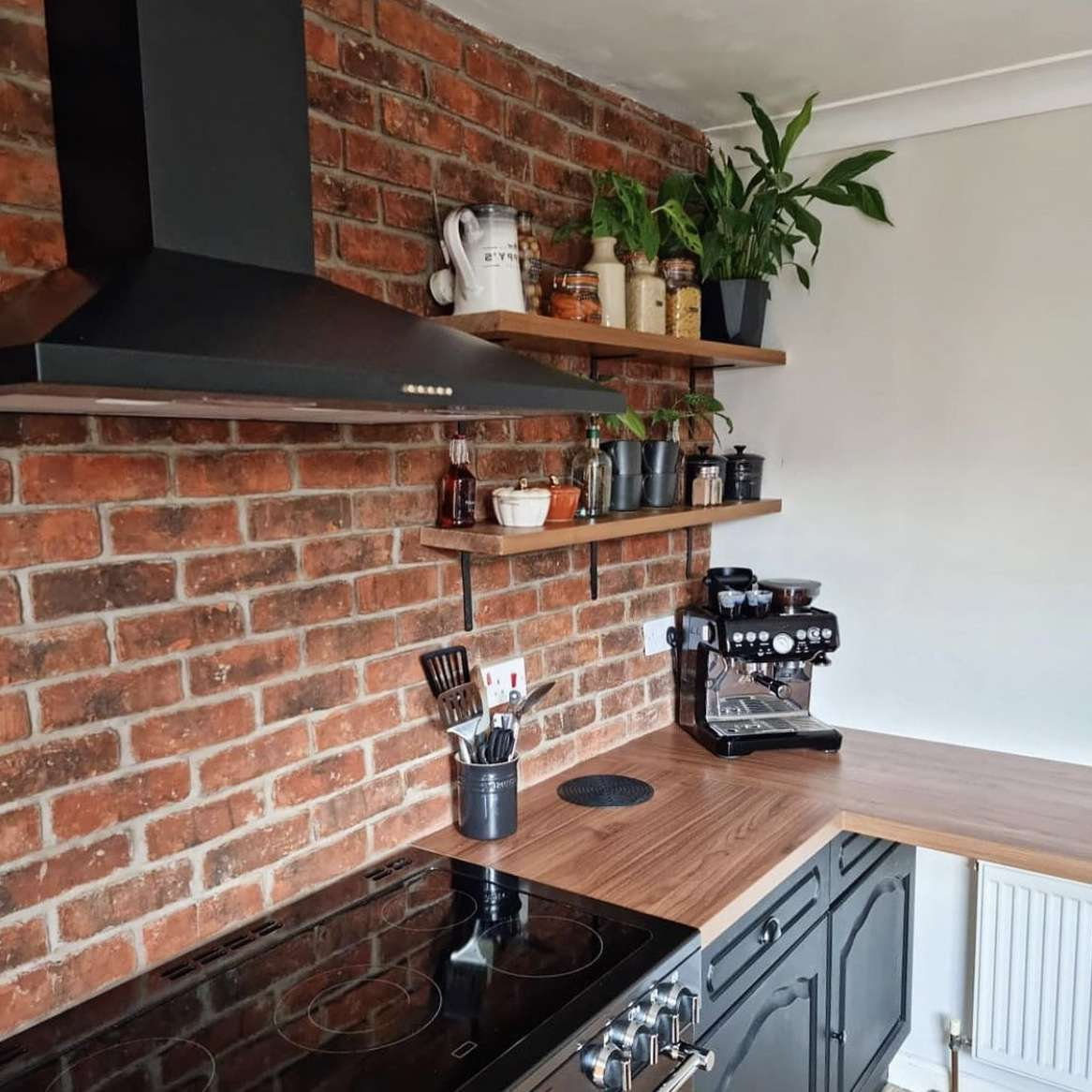 reclaimed rustic brick slip tile feature wall in family kitchen