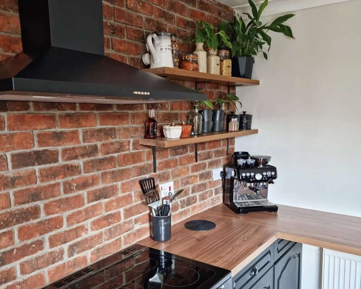 reclaimed rustic brick slip tile feature wall in family kitchen