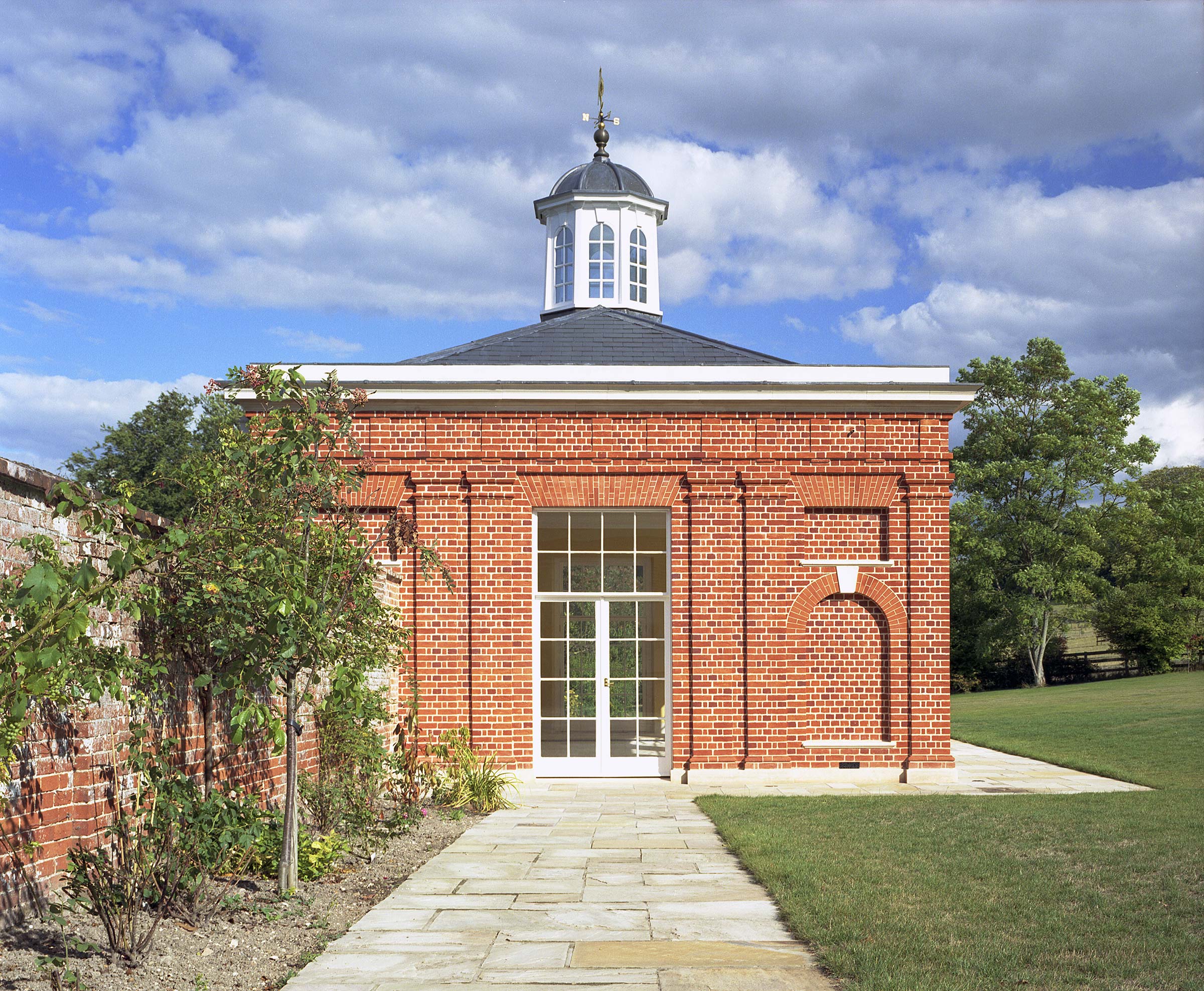 Brick built garden summer room and stone patio and vegetable patch. Bricks by Heritage Brick Co