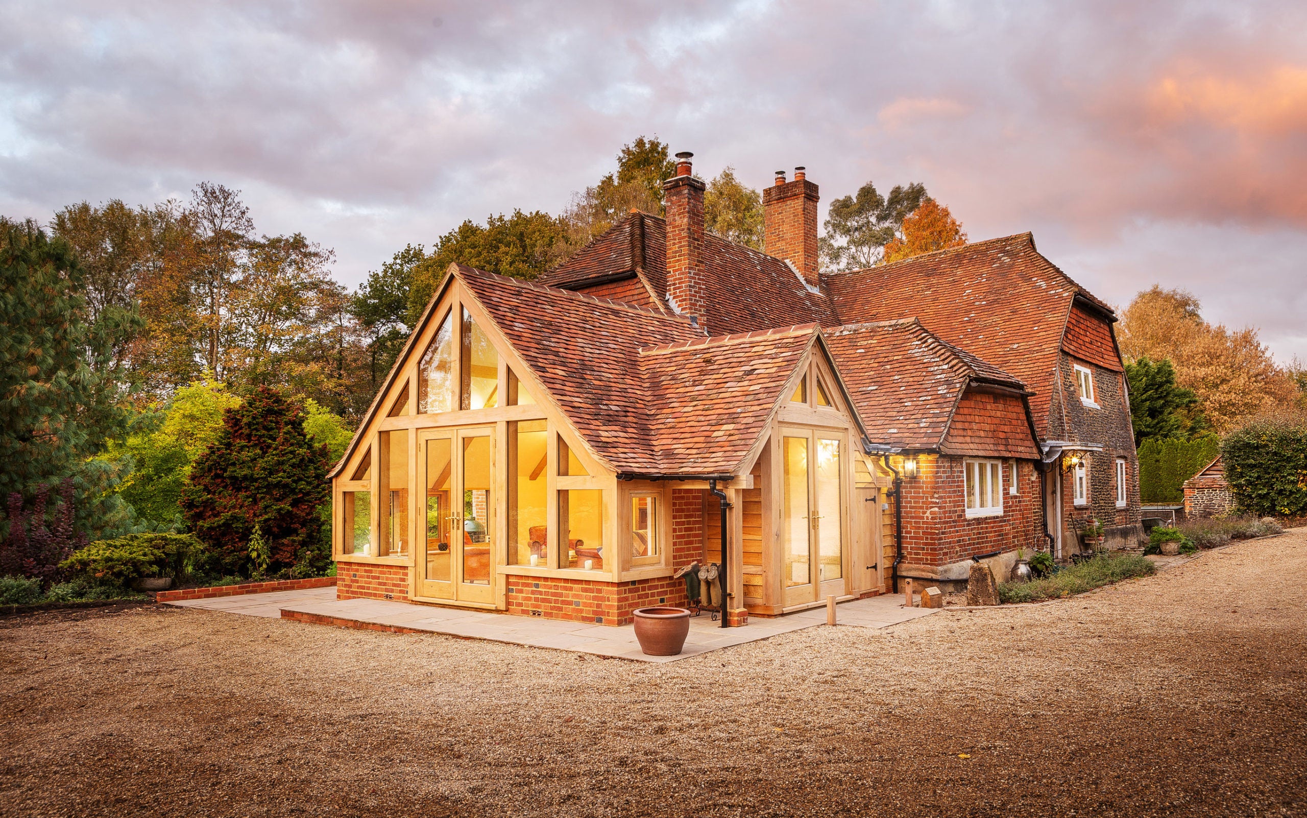 Oak frame house with new imperial handmade bricks and natural clay roof tiles supplied by Heritage Brick Company